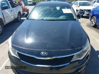 2016 Kia Optima LX with VIN 5XXGT4L3XGG013835, listed as a IAAI auction lot 41815349 with 120,628 mi miles and . Bid and sale history available at carsss.com. Image 6.