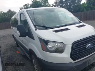 2019 Ford Transit Passenger XL z VIN 1FBZX2YM6KKA34848, wystawiony jako IAAI lot #42263441 z przebiegiem 282 788 mil mil oraz . Historia ofert i sprzedaży dostępna na DreamBid. Obrazek 1.