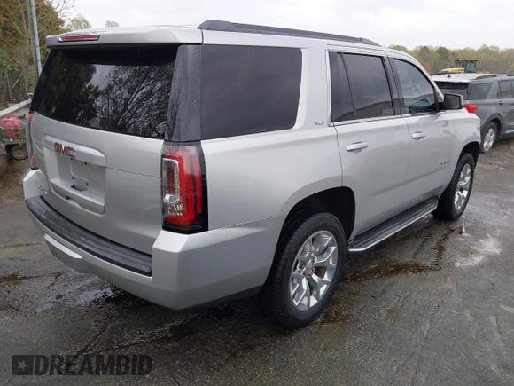 2015 GMC Yukon SLT with VIN 1GKS2BKC0FR676107, listed as a IAAI auction lot 41962929 with 132,389 mi miles. Bid and sale history available at carsss.com. Image 4.