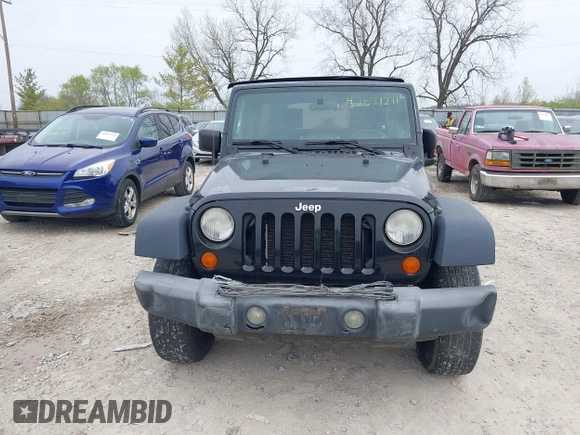 2007 Jeep Wrangler Unlimited X with VIN 1J4GA39177L153387, listed as a IAAI auction lot 42021211 with 207,965 mi miles and . Bid and sale history available at DreamBid. Image 12.