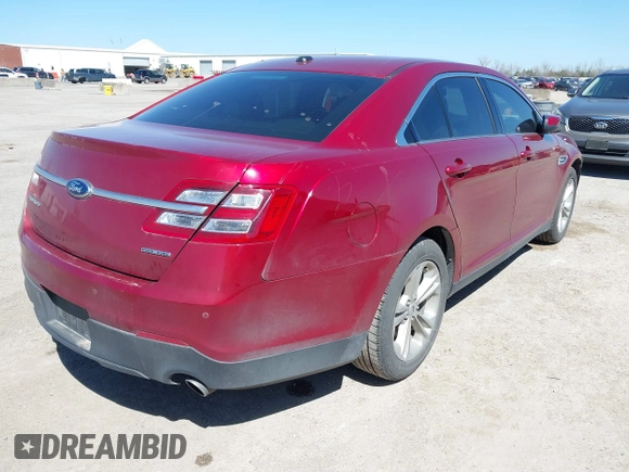 2013 Ford Taurus SEL with VIN 1FAHP2E8XDG231807, listed as a IAAI auction lot 41774166 with 120,639 mi miles and . Bid and sale history available at carsss.com. Image 4.
