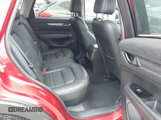 2018 Mazda CX-5 Grand Touring with VIN JM3KFADM5J0437365, listed as a IAAI auction lot 42657919 with 96,760 mi miles and . Bid and sale history available at DreamBid. Image 8.