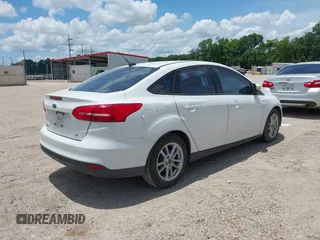 2017 Ford Focus SE z VIN 1FADP3F24HL207613, wystawiony jako IAAI lot #42596200 z przebiegiem 151 347 mil mil oraz . Historia ofert i sprzedaży dostępna na DreamBid. Obrazek 4.