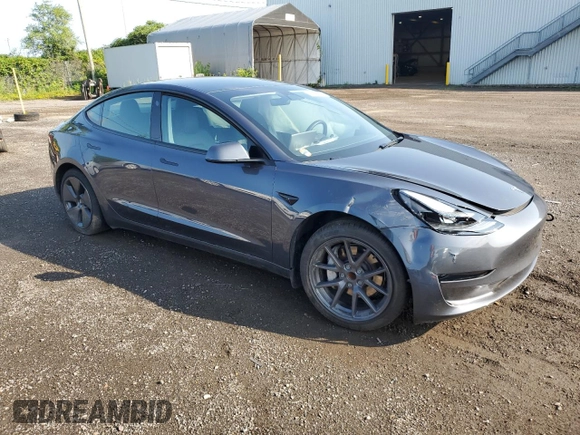 2023 Tesla Model 3 with VIN 5YJ3E1EA8PF692428, listed as a Copart auction lot 64667414 with 16,704 mi miles and Salvage Title. Bid and sale history available at DreamBid. Image 4.