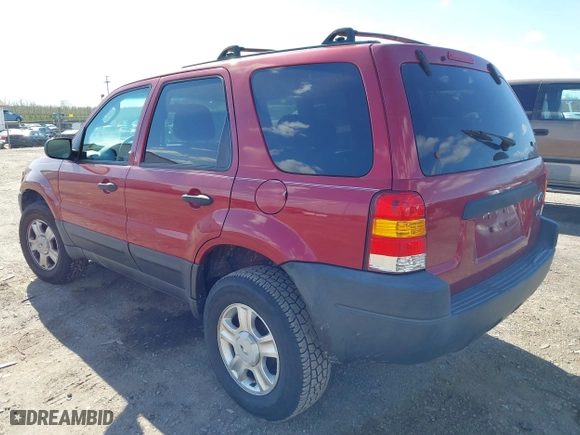 2003 Ford Escape XLT Popular with VIN 1FMYU03113KE12413, listed as a IAAI auction lot 41988476 with 157,817 mi miles. Bid and sale history available at carsss.com. Image 3.