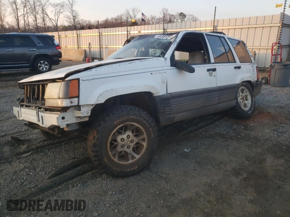 1993 Jeep Grand Cherokee Laredo with VIN 1J4GZ58Y9PC677532, listed as a Copart auction lot 44391245 with 178,772 mi miles and Salvage Title. Bid and sale history available at carsss.com. Image 1.