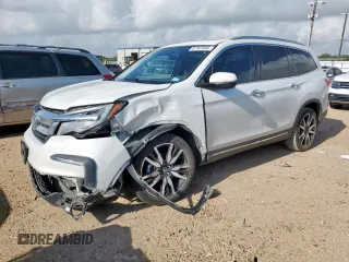 2020 Honda Pilot Touring 8-Passenger with VIN 5FNYF6H96LB002350, listed as a Copart auction lot 61507655 with 120,614 mi miles and Salvage title. Bid and sale history available at DreamBid. Image 1.