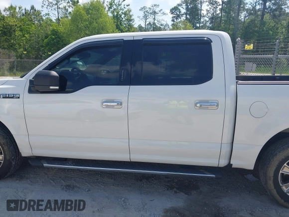 2016 Ford F-150 XLT with VIN 1FTEW1C85GFA24197, listed as a IAAI auction lot 42112608 with 234,397 mi miles and . Bid and sale history available at DreamBid. Image 14.