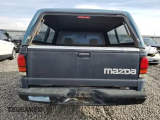 1994 Mazda B-Series Truck z VIN 4F4CR12AXRTM29986, wystawiony jako Copart lot #78825554 z przebiegiem 183 595 mil mil oraz Szkoda całkowita • Salvage title. Historia ofert i sprzedaży dostępna na DreamBid. Obrazek 10.