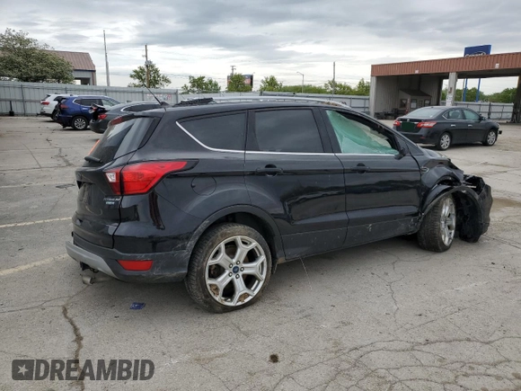 2019 Ford Escape Titanium с VIN 1FMCU9J92KUA82033, выставлен на аукционе Copart как лот 56686235 с пробегом Не указан миль и Списание • Salvage title. История ставок и продаж доступна на DreamBid. Изображение 3.