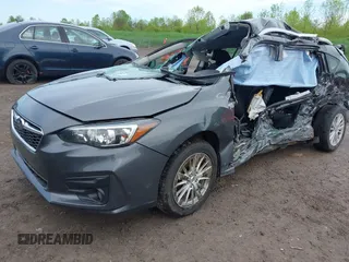 2018 Subaru Impreza Premium z VIN 4S3GTAD67J3701533, wystawiony jako IAAI lot #42157704 z przebiegiem 63 999 mil mil oraz . Historia ofert i sprzedaży dostępna na DreamBid. Obrazek 2.