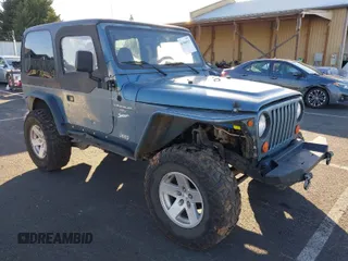 1998 Jeep Wrangler Sport with VIN 1J4FY19S4WP716469, listed as a IAAI auction lot 41506513 with 142,289 mi miles. Bid and sale history available at carsss.com. Image 1.