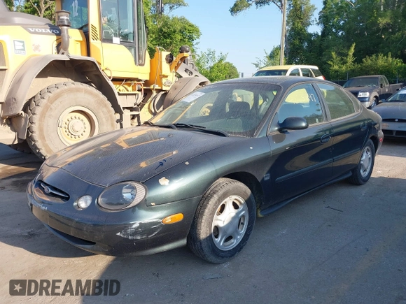 1999 Ford Taurus SE Comfort z VIN 1FAFP53S3XG104165, wystawiony jako IAAI lot #42234147 z przebiegiem 183 124 mil mil oraz . Historia ofert i sprzedaży dostępna na DreamBid. Obrazek 2.