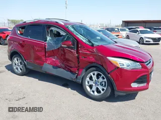 2015 Ford Escape Titanium with VIN 1FMCU0J97FUA43830, listed as a IAAI auction lot 42742430 with 84,136 mi miles and . Bid and sale history available at DreamBid. Image 1.