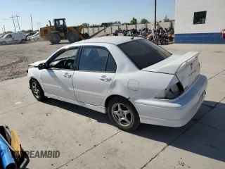 2002 Mitsubishi Lancer OZ-Rally with VIN JA3AJ86E72U081253, listed as a Copart auction lot 48244185 with 260,671 mi miles and Salvage Title. Bid and sale history available at carsss.com. Image 2.