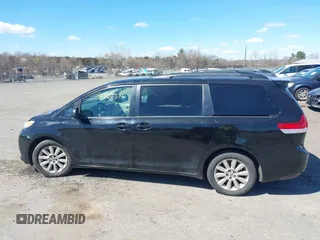 2012 Toyota Sienna XLE with VIN 5TDDK3DC1CS047105, listed as a IAAI auction lot 41901541 with 176,476 mi miles. Bid and sale history available at carsss.com. Image 14.