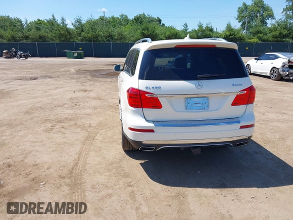 2014 Mercedes-Benz GL 450 with VIN 4JGDF7CE3EA336481, listed as a IAAI auction lot 42647526 with 145,311 mi miles and . Bid and sale history available at DreamBid. Image 3.