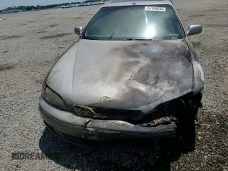 1999 Lexus ES 300 z VIN JT8BF28G6X0220031, wystawiony jako Copart lot #57346835 z przebiegiem Nie podano mil oraz Szkoda całkowita • Salvage title. Historia ofert i sprzedaży dostępna na DreamBid. Obrazek 13.