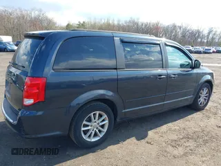 2013 Dodge Grand Caravan SXT with VIN 2C4RDGCG2DR652708, listed as a IAAI auction lot 42043026 with 245,442 mi miles and . Bid and sale history available at DreamBid. Image 12.