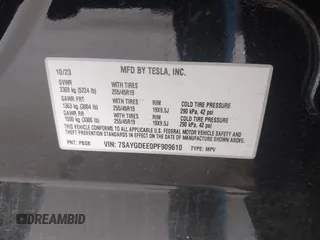 2023 Tesla Model Y Long Range with VIN 7SAYGDEE0PF909610, listed as a IAAI auction lot 41906081 with 20,656 mi miles and . Bid and sale history available at DreamBid. Image 9.
