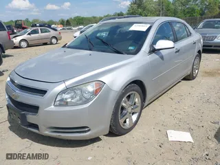 2012 Chevrolet Malibu LT w/2LT with VIN 1G1ZD5E09CF330571, listed as a IAAI auction lot 42103653 with 203,135 mi miles. Bid and sale history available at carsss.com. Image 2.