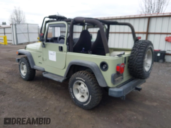 2001 Jeep Wrangler Sport with VIN 1J4FA49S91P354668, listed as a IAAI auction lot 41883227 with 197,043 mi miles and . Bid and sale history available at DreamBid. Image 3.