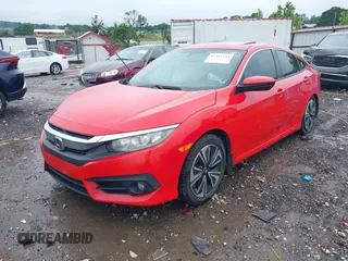 2016 Honda Civic EX-L with VIN 2HGFC1F7XGH656001, listed as a IAAI auction lot 42412343 with 227,271 mi miles and . Bid and sale history available at DreamBid. Image 2.
