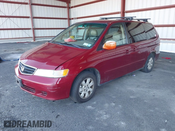 2004 Honda Odyssey EX-L with VIN 5FNRL18994B048661, listed as a IAAI auction lot 41758209 with 295,737 mi miles and . Bid and sale history available at DreamBid. Image 2.
