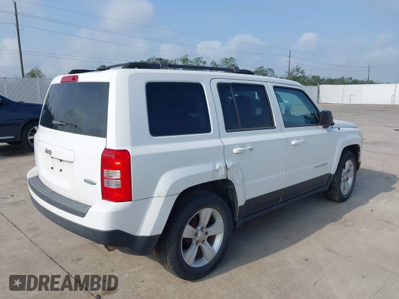 2014 Jeep Patriot Latitude with VIN 1C4NJPFA3ED618523, listed as a IAAI auction lot 41750625 with Not Provided miles and . Bid and sale history available at carsss.com. Image 4.