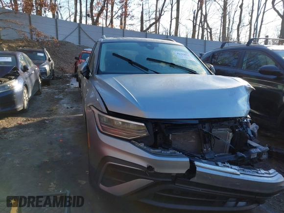 2023 Volkswagen Tiguan SE with VIN 3VVMB7AX7PM017807, listed as a IAAI auction lot 41422055 with 23,974 mi miles and . Bid and sale history available at DreamBid. Image 22.