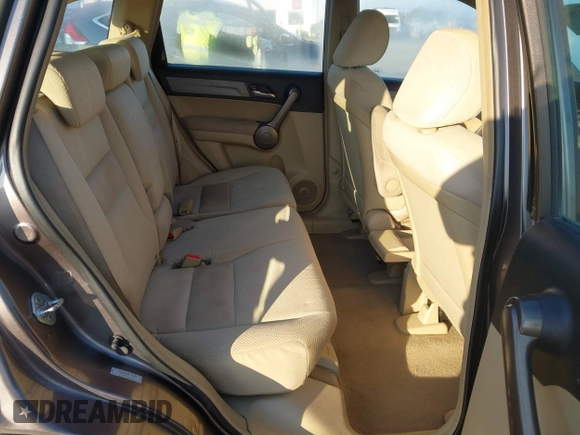 2009 Honda CR-V LX with VIN 5J6RE48389L011915, listed as a IAAI auction lot 41301796 with 214,807 mi miles. Bid and sale history available at carsss.com. Image 8.