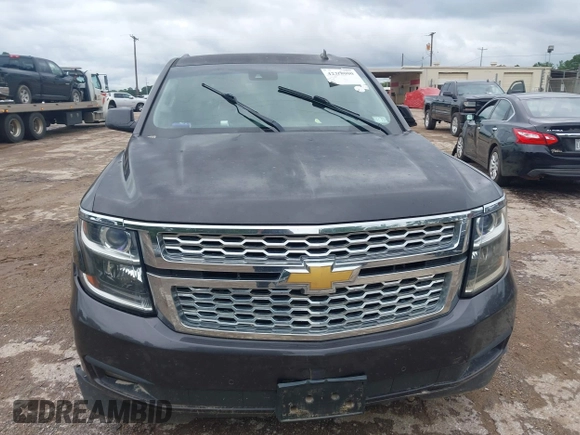 2015 Chevrolet Tahoe LT with VIN 1GNSCBKC4FR183580, listed as a IAAI auction lot 42318000 with Not provided miles and . Bid and sale history available at DreamBid. Image 6.