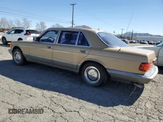 1987 Mercedes-Benz 560 with VIN WDBCA39D1HA280016, listed as a Copart auction lot 46277905 with 151,078 mi miles and Clean Title. Bid and sale history available at DreamBid. Image 2.