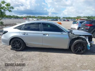 2025 Honda Civic Sport z VIN 2HGFE2F59SH549528, wystawiony jako IAAI lot #42232674 z przebiegiem 8 889 mil mil oraz . Historia ofert i sprzedaży dostępna na DreamBid. Obrazek 13.