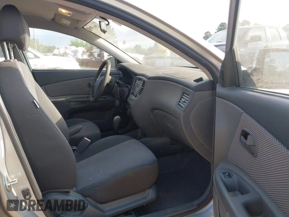 2009 Kia Rio LX with VIN KNADE243896483683, listed as a IAAI auction lot 42061404 with 88,614 mi miles. Bid and sale history available at carsss.com. Image 5.