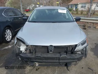 2014 Volkswagen Jetta S with VIN 3VW2K7AJ7EM313535, listed as a IAAI auction lot 41786112 with 63,694 mi miles and . Bid and sale history available at DreamBid. Image 12.