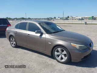 2006 BMW 5 Series 525i with VIN WBANE53506CK87274, listed as a IAAI auction lot 41821580 with 270,886 mi miles. Bid and sale history available at carsss.com. Image 1.