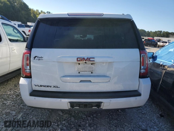 2019 GMC Yukon XL SLT with VIN 1GKS1GKCXKR239712, listed as a Copart auction lot 74721584 with 143,690 mi miles and Salvage Title. Bid and sale history available at carsss.com. Image 6.