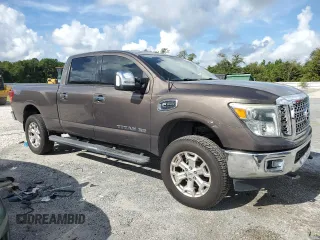2016 Nissan Titan XD Platinum Reserve with VIN 1N6BA1F20GN500500, listed as a Copart auction lot 75396354 with 164,966 mi miles and Salvage Title. Bid and sale history available at carsss.com. Image 4.