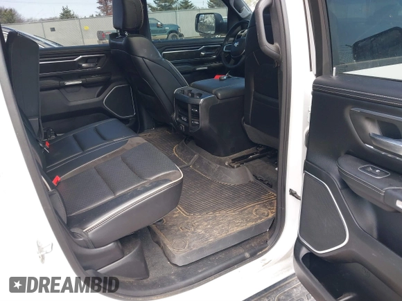 2023 Ram 1500 Laramie with VIN 1C6SRFJT8PN520610, listed as a IAAI auction lot 41898526 with 23,605 mi miles and . Bid and sale history available at DreamBid. Image 8.