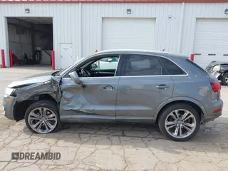 2015 Audi Q3 Prestige with VIN WA1GFCFS9FR007776, listed as a IAAI auction lot 42126928 with 110,981 mi miles and . Bid and sale history available at DreamBid. Image 14.
