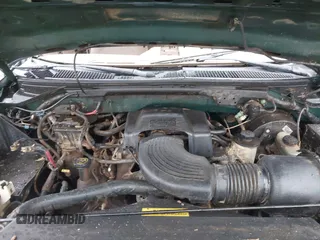 1999 Ford F-150 XL with VIN 1FTRX18L9XNA66552, listed as a IAAI auction lot 41284259 with Not provided miles and . Bid and sale history available at DreamBid. Image 10.