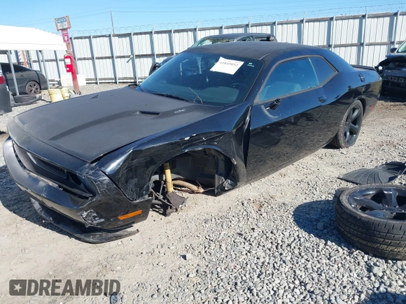 2014 Dodge Challenger R/T Plus z VIN 2C3CDYBT2EH274265, wystawiony jako IAAI lot #41845052 z przebiegiem 120 290 mil mil oraz . Historia ofert i sprzedaży dostępna na DreamBid. Obrazek 2.