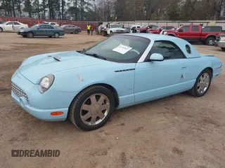 2003 Ford Thunderbird Deluxe z VIN 1FAHP60A53Y101461, wystawiony jako IAAI lot #41797831 z przebiegiem 64 760 mil mil oraz . Historia ofert i sprzedaży dostępna na DreamBid. Obrazek 2.