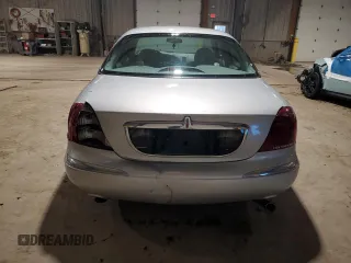 2001 Lincoln Continental with VIN 1LNHM97V51Y698794, listed as a Copart auction lot 47649315 with 84,465 mi miles and Salvage Title. Bid and sale history available at DreamBid. Image 6.