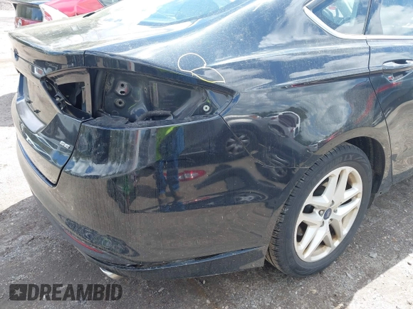2015 Ford Fusion SE with VIN 1FA6P0H77F5122055, listed as a IAAI auction lot 42198056 with 151,029 mi miles and . Bid and sale history available at DreamBid. Image 6.