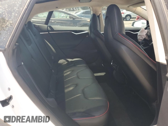 2013 Tesla Model S Performance с VIN 5YJSA1DP3DFP10567, выставлен на аукционе Copart как лот 58352955 с пробегом 128 438 миль миль и Списание • Salvage title. История ставок и продаж доступна на DreamBid. Изображение 10.