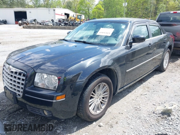 2009 Chrysler 300 Touring with VIN 2C3KA53V99H584082, listed as a IAAI auction lot 42026860 with 147,558 mi miles. Bid and sale history available at carsss.com. Image 2.