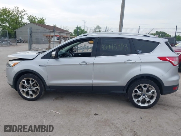 2013 Ford Escape Titanium with VIN 1FMCU9J97DUD16072, listed as a IAAI auction lot 42445993 with 111,255 mi miles and . Bid and sale history available at DreamBid. Image 14.