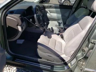 2004 Volkswagen Passat GLS z VIN WVWVD63B94E003336, wystawiony jako Copart lot #70246204 z przebiegiem 126 163 mil mil oraz Szkoda całkowita • Salvage title. Historia ofert i sprzedaży dostępna na DreamBid. Obrazek 7.